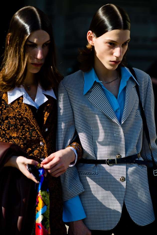 Street style photo of women wearing directional fashion